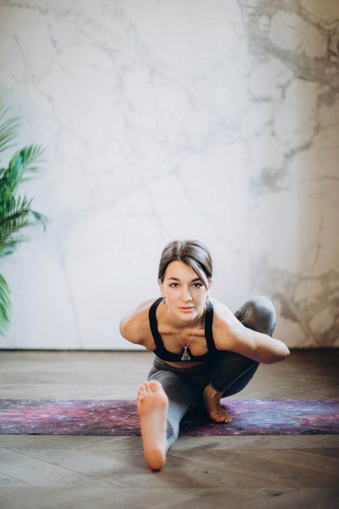 Young girl doing yoga.